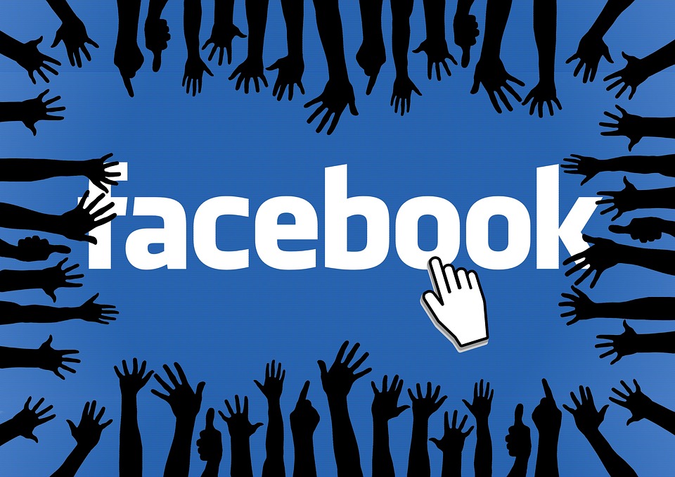 Facebook logo with hands