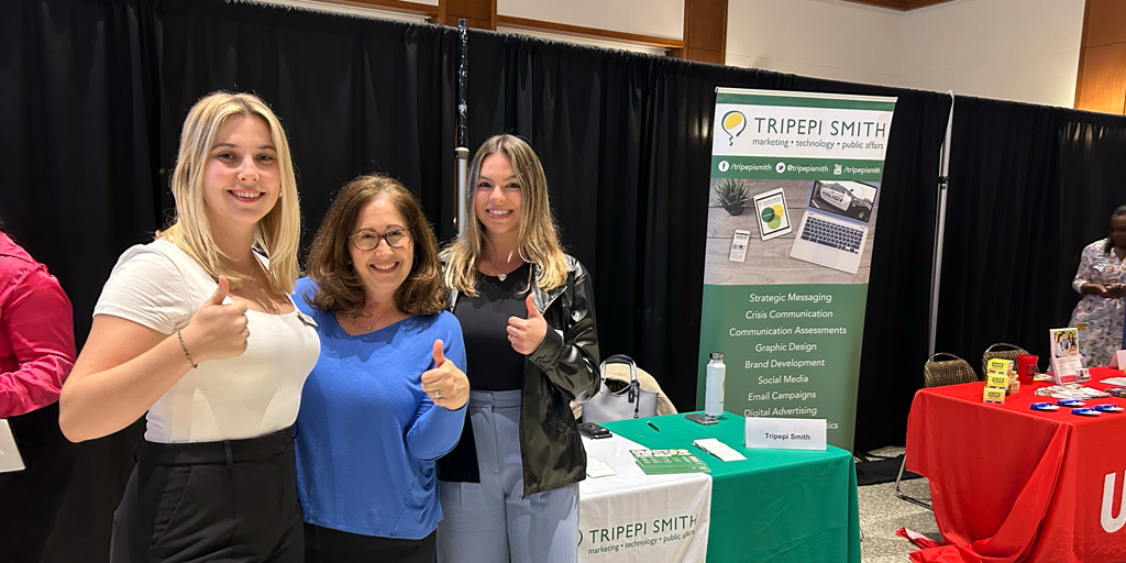 TS Syndey Fitch, Allison Molnar, and Morgan Mock thumbs up at SDSU career fair